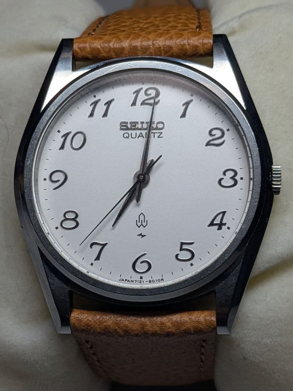 SEIKO Chario Unisex Quartz Watch White Dial Tan Brown Leather Strap Arabic