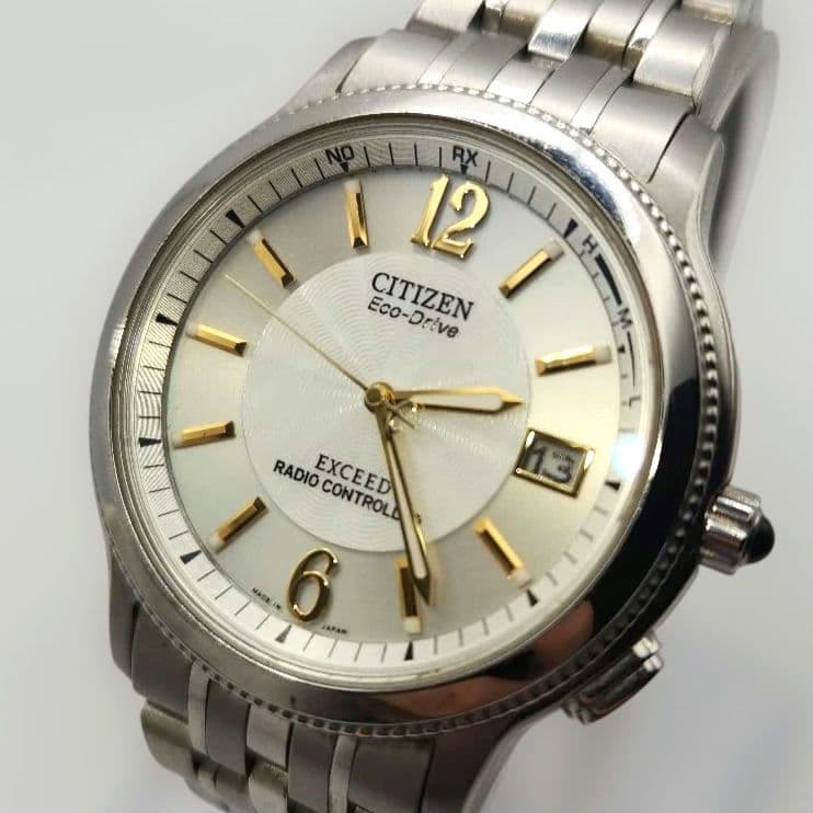 CITIZEN Exceed H410-T007716 Mens Titanium Radio Solar Date Watch Silver Gold