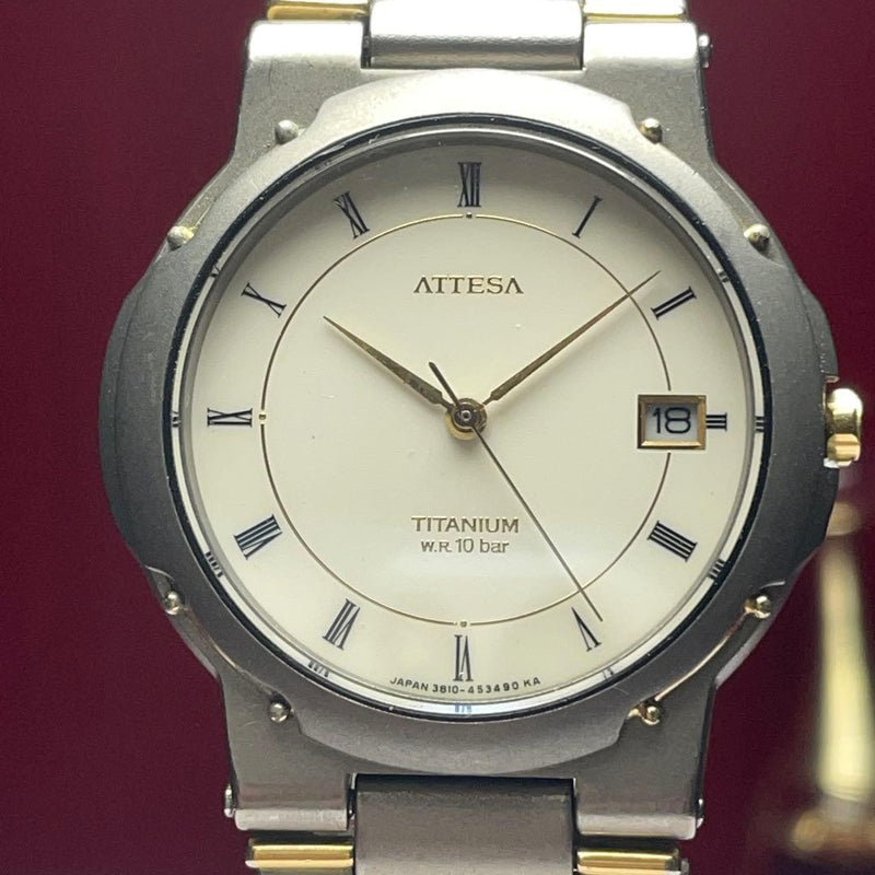 CITIZEN Attesa 1988 Titanium Gold Tone 34mm Ivory Roman Dial Quartz Watch 10 Bar