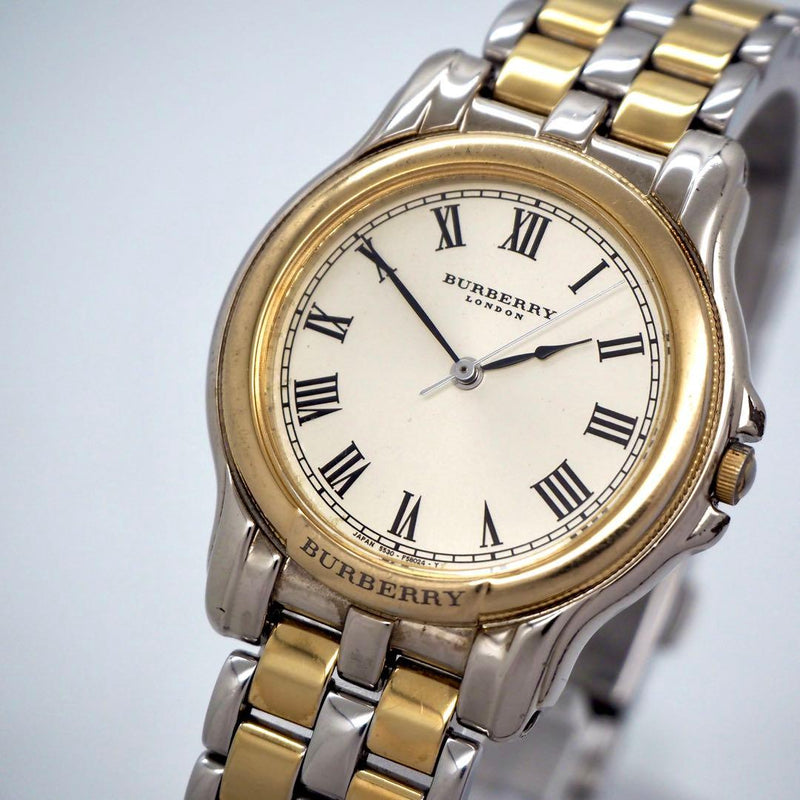 BURBERRY 76 Mens Quartz Watch 32mm Champagne Gold Roman Dial Gold Silver