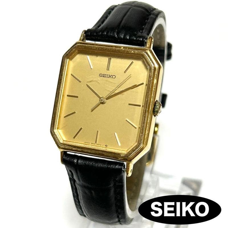 SEIKO 5P31-5C50 Quartz Octagon Gold Case 27.4mm Gold Dial Black Strap Watch