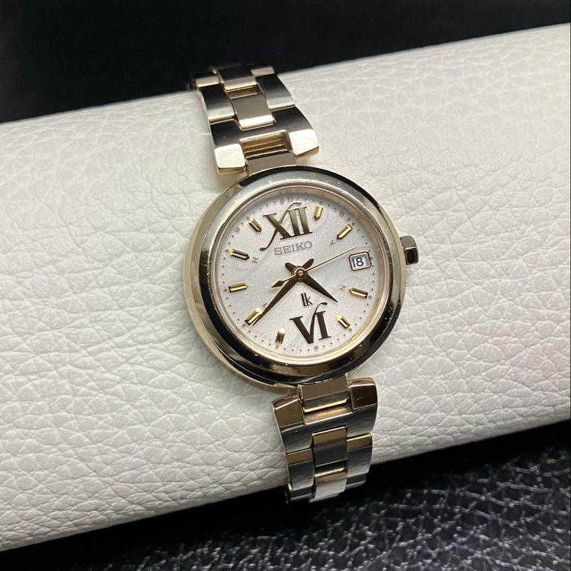 SEIKO LUKIA 1B22-0AC0 SSVW004 Ladies Solar Radio SS Champagne Gold Silver Dial