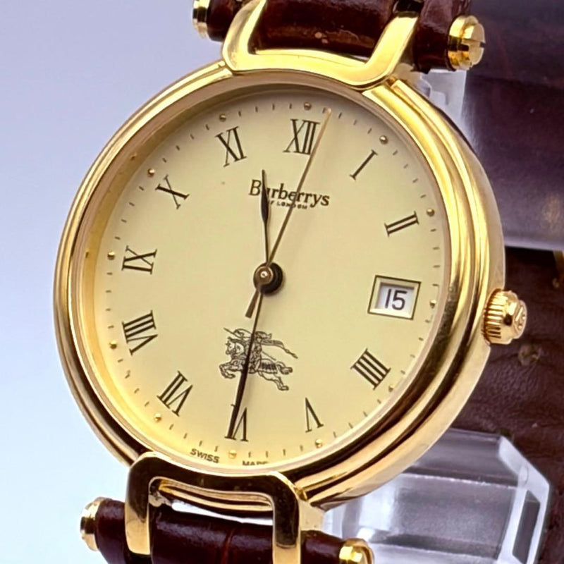 Burberrys Mens Quartz Watch Gold Case Dial Date Leather Band Roman Numeral