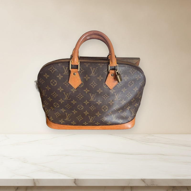 Louis Vuitton Alma Pm Monogram Handbag Brown