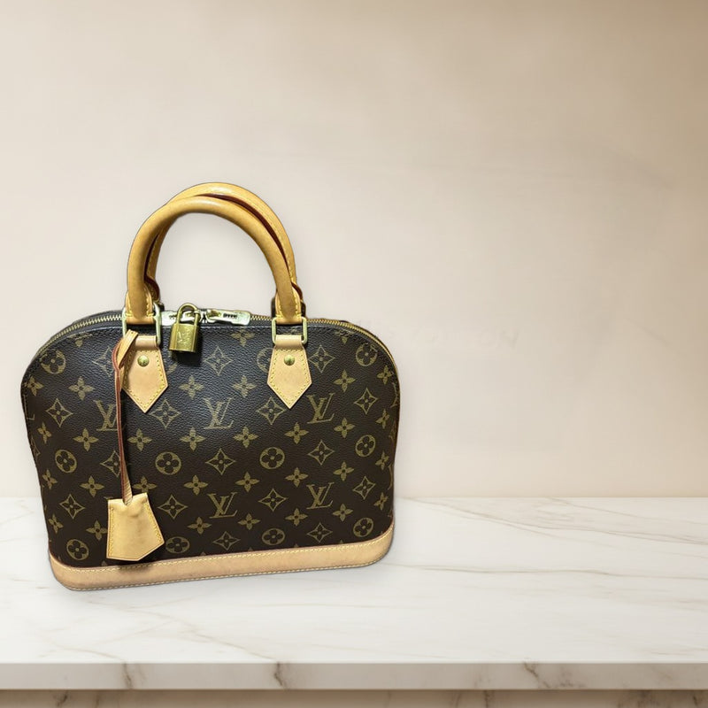 Louis Vuitton Alma Pm Handbag Monogram Canvas Natural Cowhide Gold Hardware