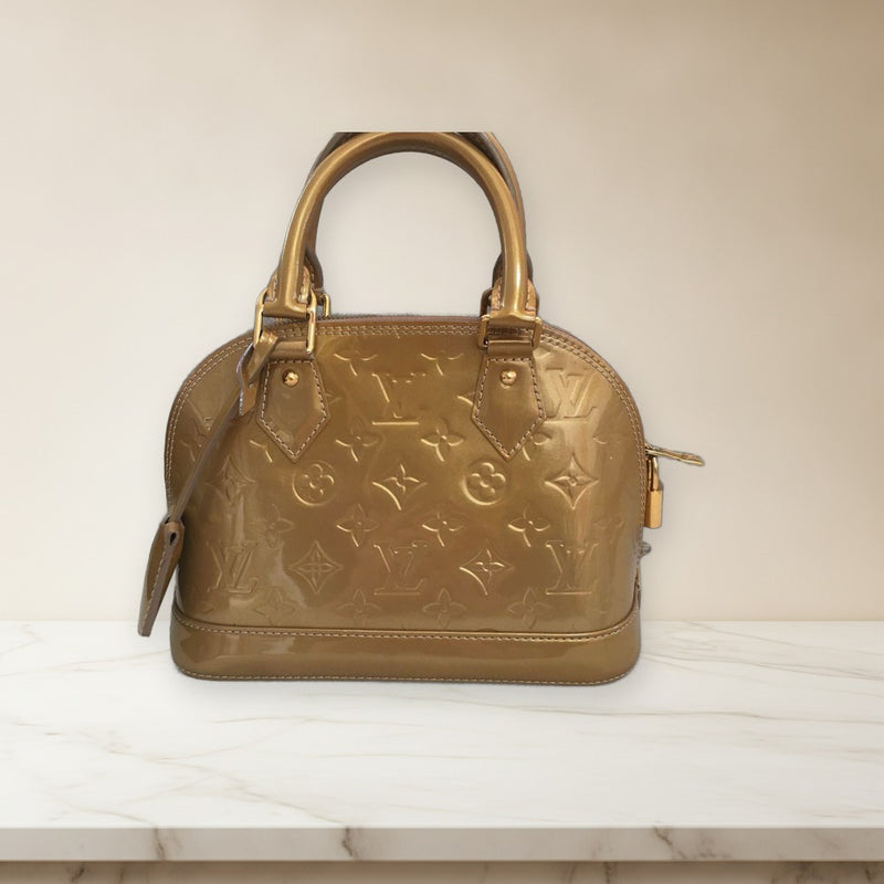 Louis Vuitton Alma Bb Handbag Vernis Gold Leather