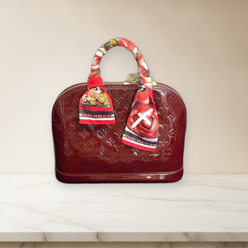 Louis Vuitton Embossed Handbag Red Leather With Key And Lock