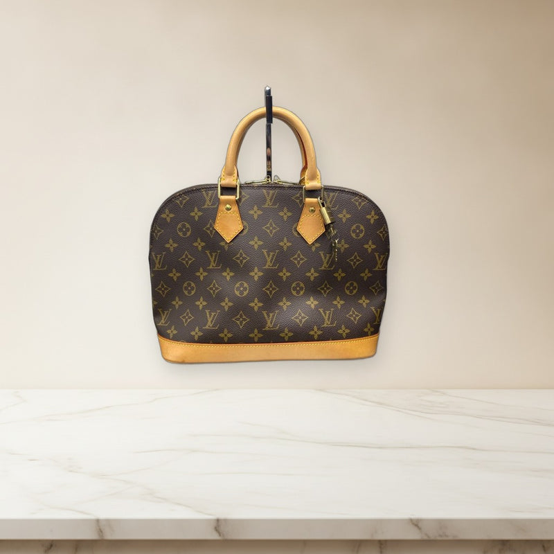 Louis Vuitton Monogram Alma Handbag Brown Vachetta Leather Padlock Keys