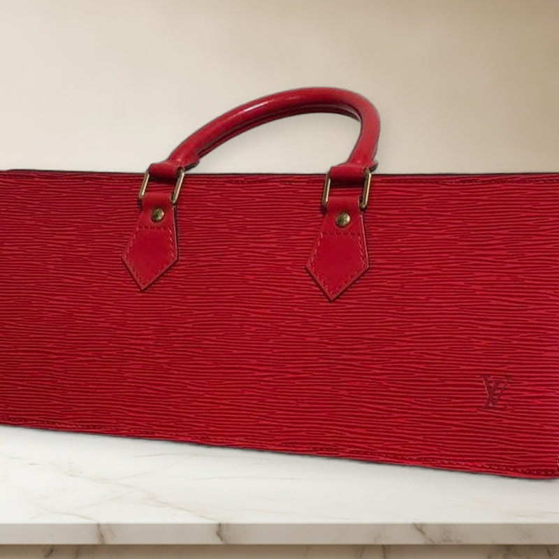 Louis Vuitton Sac Triangle Handbag Epi Leather Castilian Red