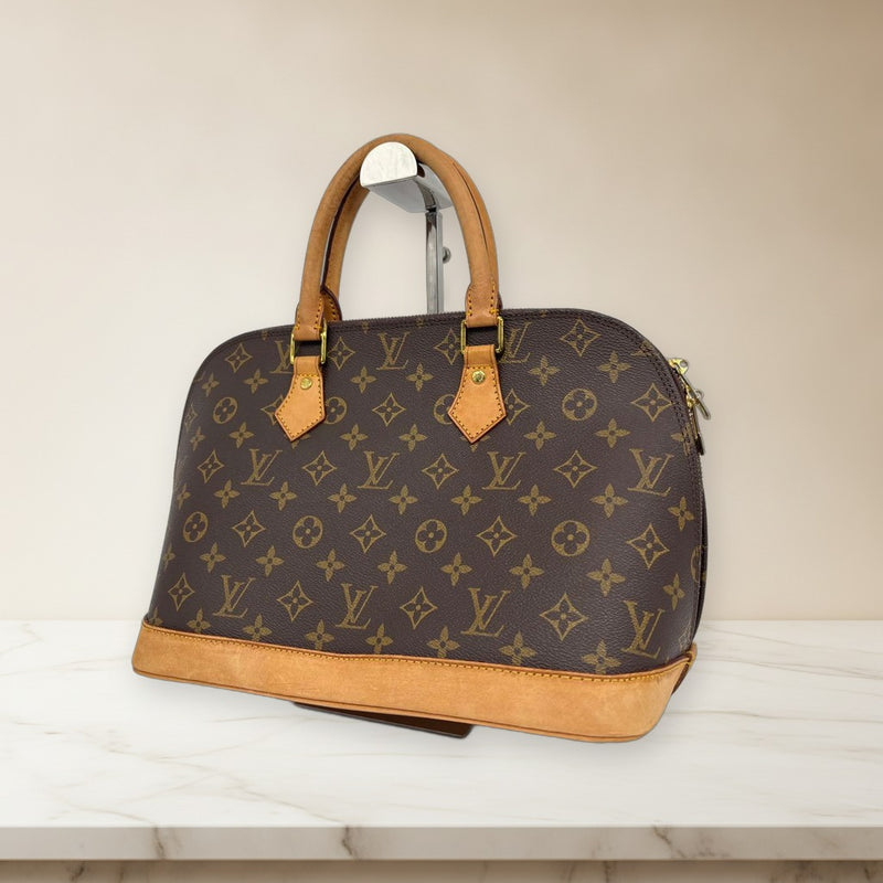 Louis Vuitton Alma Monogram Handbag Pvc Leather Brown