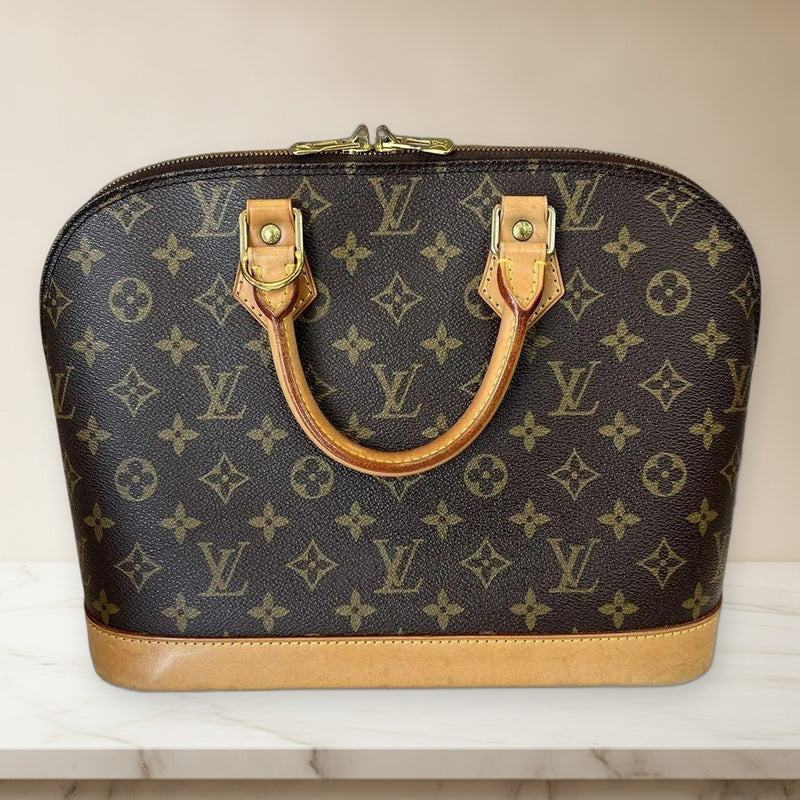 Louis Vuitton Alma Monogram Handbag Brown Coated Canvas Gold Hardware